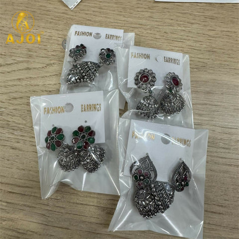 Enhance your ethnic look with this stunning Oxidised Silver Jhumka Earrings Combo Set,